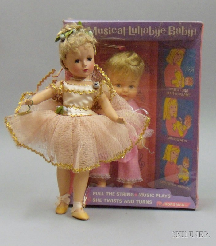 Appraisal: Two Modern Boxed Plastic Dolls Madame Alexander style hard plastic