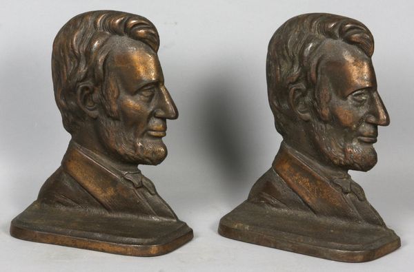 Appraisal: Pair of antique bronzed iron bookends of President Abraham Lincoln