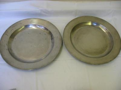 Appraisal: A PAIR OF GEORGE III PEWTER CHARGERS of plain rim