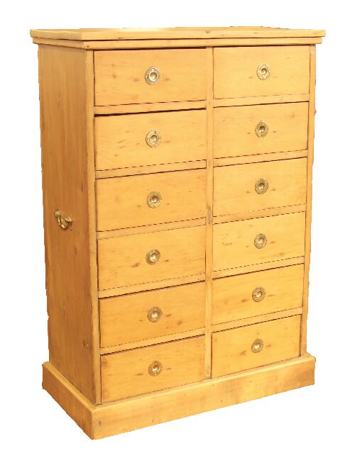 Appraisal: A pine chest the rectangular top above two banks of