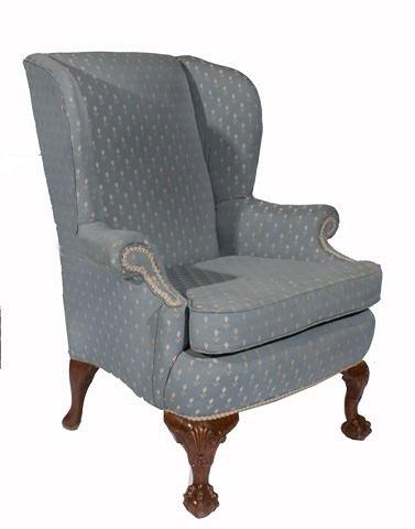 Appraisal: AN TH CENTURY STYLE WING BACK ARMCHAIR with light blue