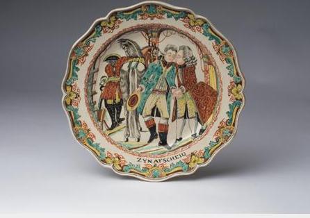 Appraisal: ENGLISH CREAMWARE DUTCH-DECORATED 'THE PRODIGAL SON' PLATE CIRCA Painted in