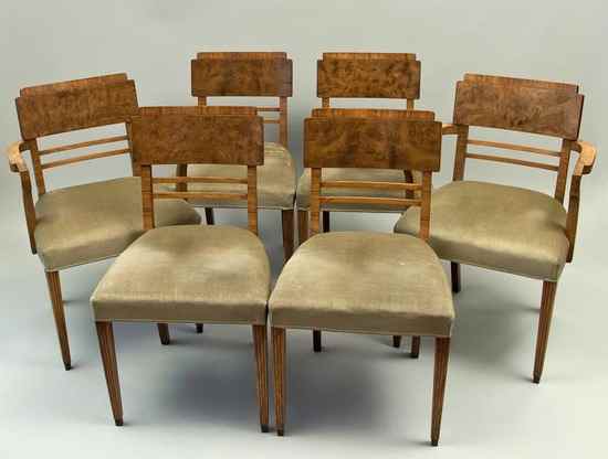 Appraisal: A set of walnut dining chairs in the Art Deco