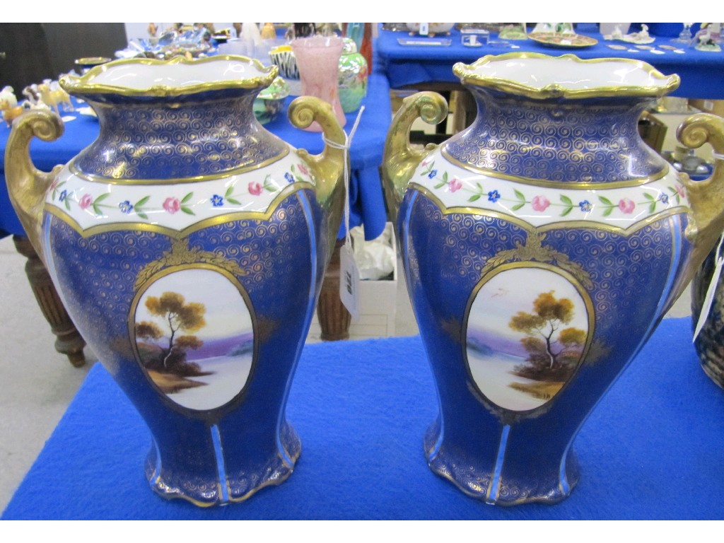 Appraisal: Pair of Noritake vases each side with a central cartouche