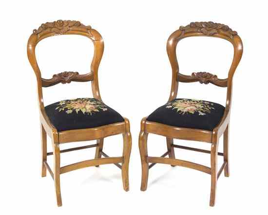 Appraisal: A Pair of Victorian Balloon Back Side Chairs having a