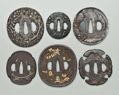 Appraisal: Six Japanese iron tsuba all with carved elements kinko tsuba