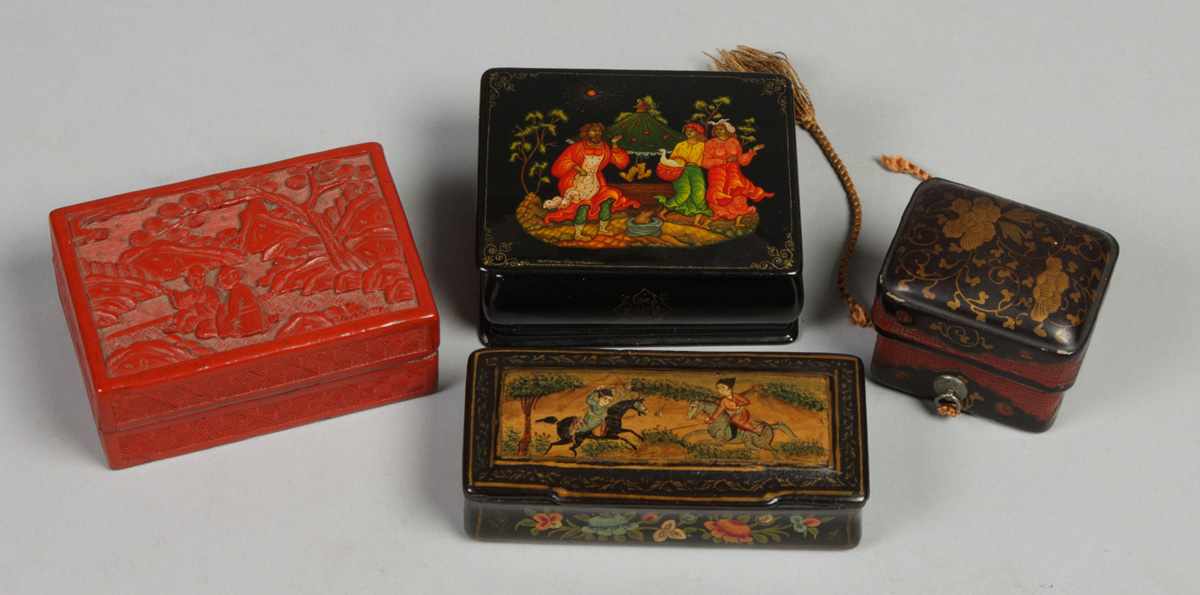 Appraisal: Group of lacquered cinnabar oriental snuff boxes Group of lacquered