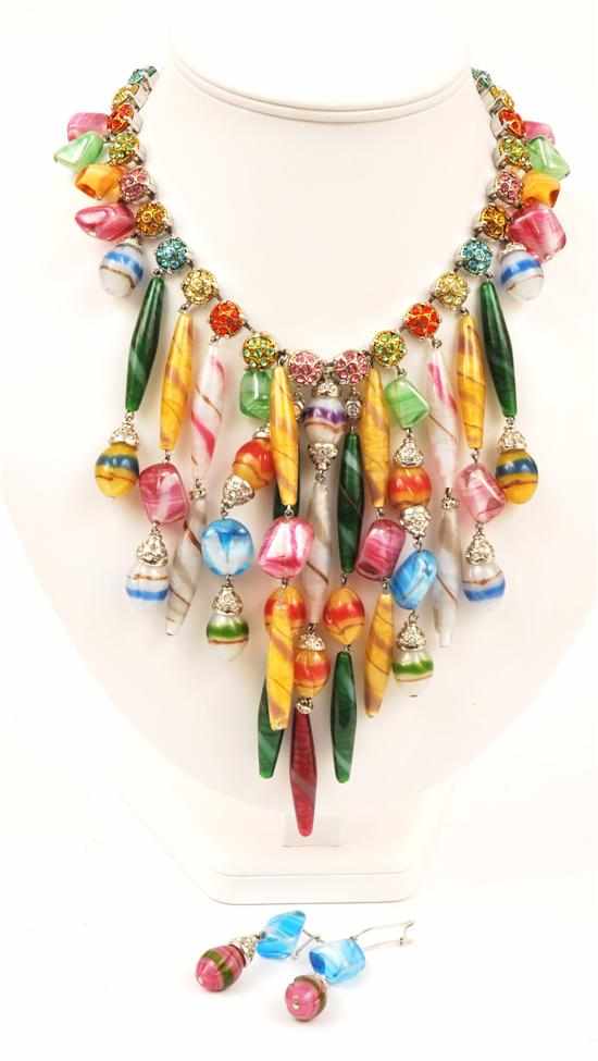 Appraisal: A PENDANT NECKLACE BY CARLO ZINI The coloured paste cluster