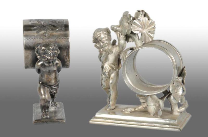 Appraisal: Lot of Figural Napkin Rings Description Includes walking angel carrying