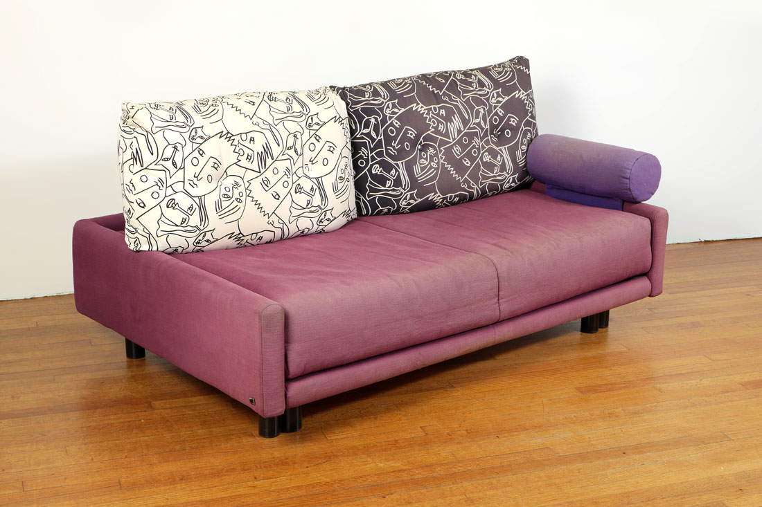 Appraisal: LIGNE ROSET PLUM SOFA DAYBED Plum colored upholstered day bed