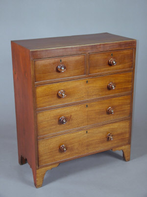 Appraisal: A mahogany chest of drawers th century of two short