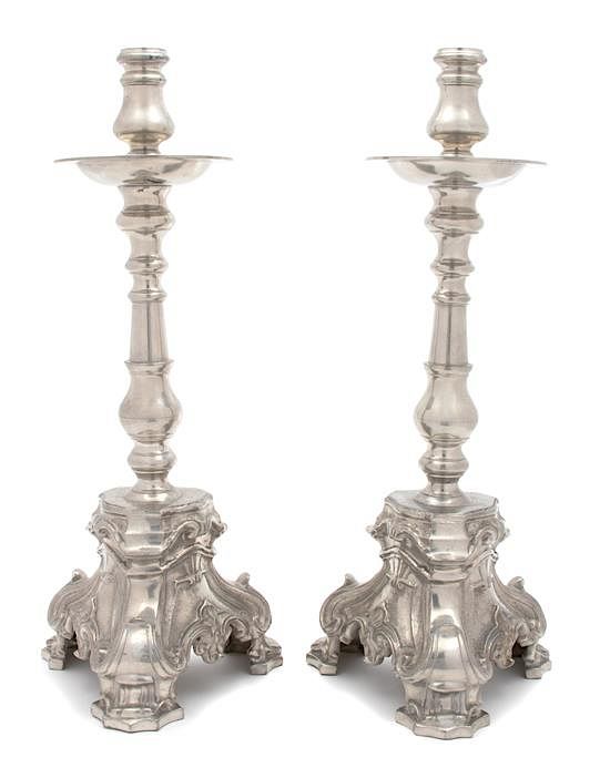 Appraisal: A Pair of English Silverplate Candlesticks Height inches A Pair