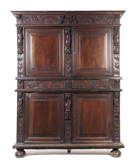 Appraisal: A Renaissance Revival Walnut Cupboard having a molded cornice over