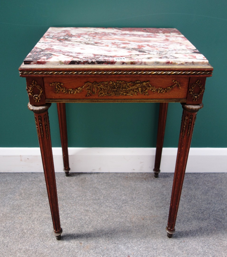 Appraisal: An Empire style side table the rectangular marble top over