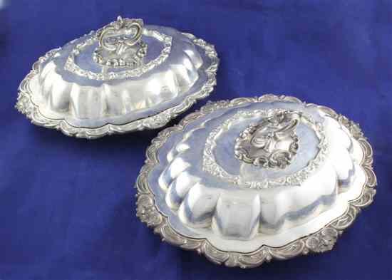 Appraisal: A pair of William IV silver entree dishes and covers