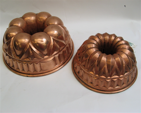 Appraisal: TWO TH CENTURY ROUND COPPER FOOD MOLDS tin lined with