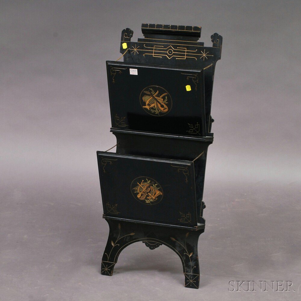 Appraisal: Victorian Ebonized Magazine Rack late th century the shaped cresting