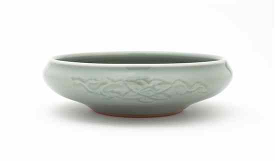 Appraisal: A Celadon Glazed Porcelain Bowl of squat form having a