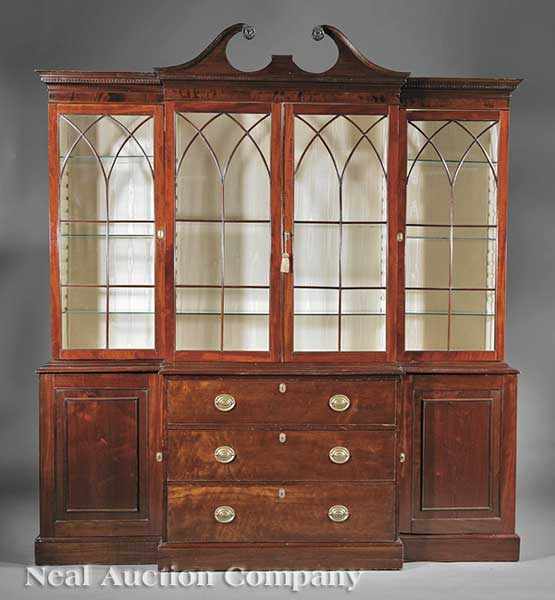 Appraisal: An Antique Georgian-Style Mahogany Breakfront probably early th c the