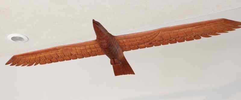 Appraisal: Carved Folk Art Eagleexotic hardwood massive wingspan appears to be