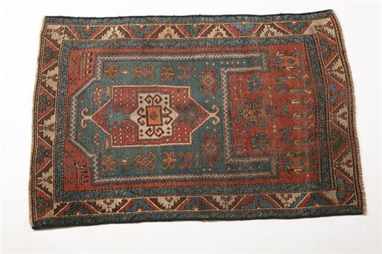 Appraisal: ORIENTAL RUG Kazak Multi-colored border with green ground Wear '