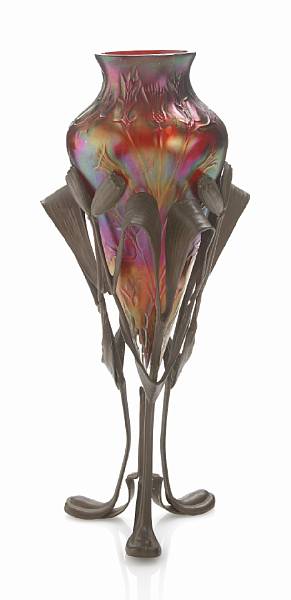 Appraisal: An Austrian iridescent glass and patinated-metal vase early th century