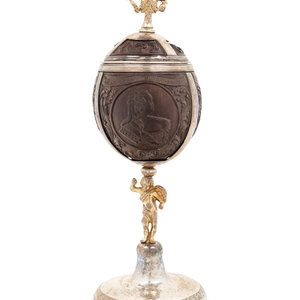 Appraisal: A Silver-Gilt Mounted Carved Coconut Cup and Cover of Russian