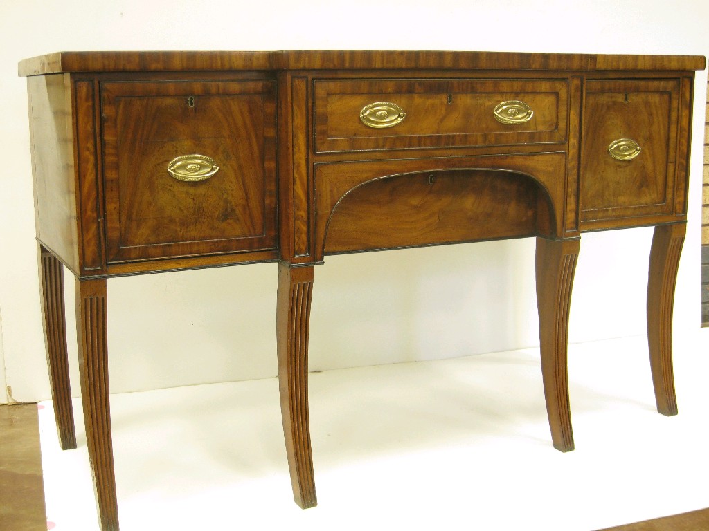 Appraisal: A Regency mahogany Scottish Break-front Sideboard having two central drawers