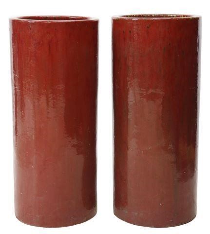 Appraisal: pair Architectural ceramic planters st c tall cylindrical form in