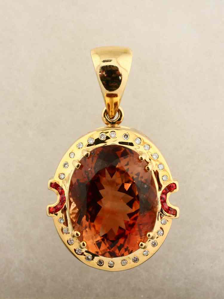 Appraisal: LADY'S PENDANT - One K yellow gold Imperial topaz slide