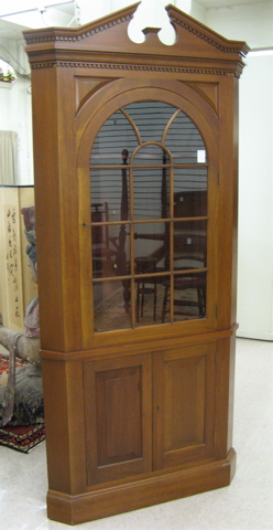 Appraisal: COLONIAL REVIVAL MAHOGANY AND CHERRY CORNER CUPBOARD American mid th