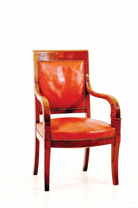 Appraisal: French Directoire style upholstered armchair shaped padded back with rolled