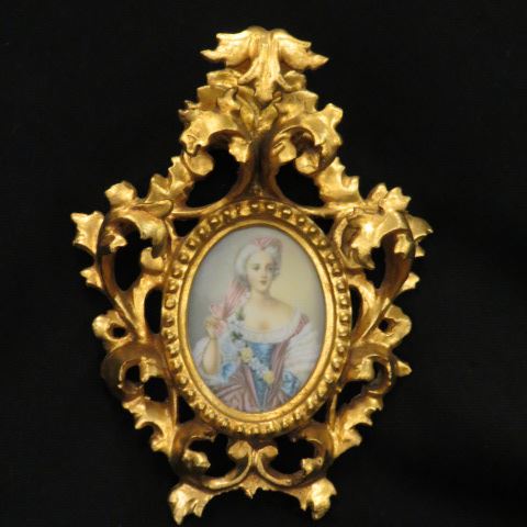 Appraisal: Miniature Painting on Ivory of a Lady in ornate carved