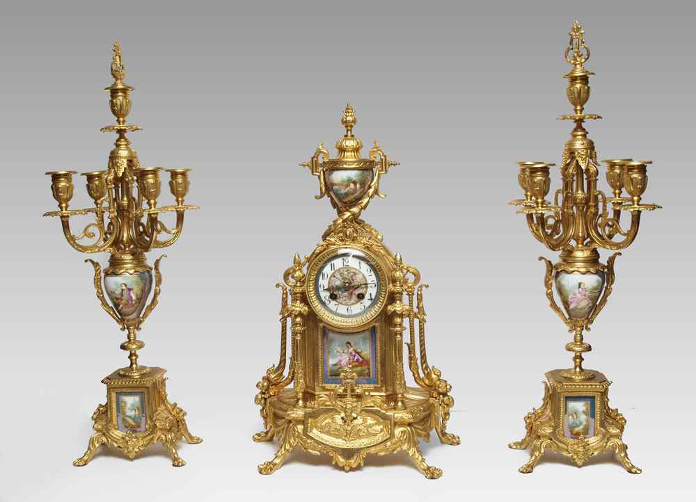 Appraisal: FRENCH STYLE BRONZE DORE CLOCK GARNITURE SET Ornate German clock