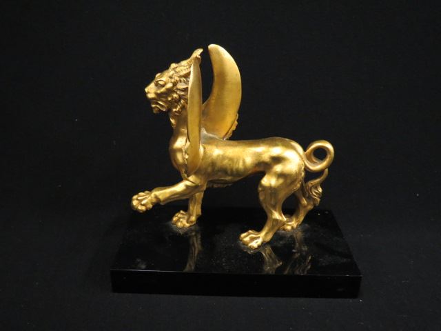 Appraisal: Dore Bronze Figurine of a Winged Lion black marble base