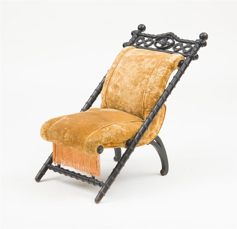 Appraisal: GEORGE HUNZINGER American Aesthetic Movement ebonized faux bamboo slipper chair