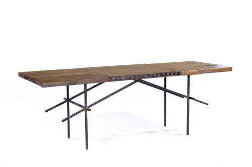 Appraisal: HARRY BALMER Yellow pine writing table with riveted leather writing