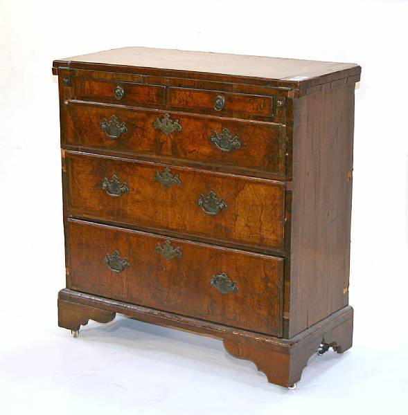 Appraisal: A George II walnut and oak bachelor's chest mid th