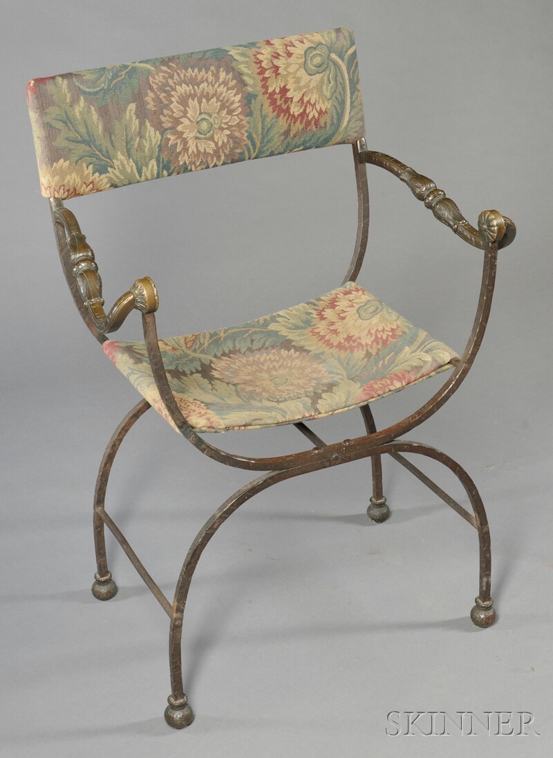 Appraisal: Tapestry Upholstered Iron Curule Chair of typical form with stylized