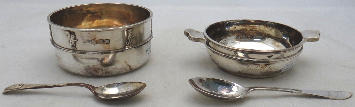 Appraisal: A silver christening porringer and spoon each decorated with animals