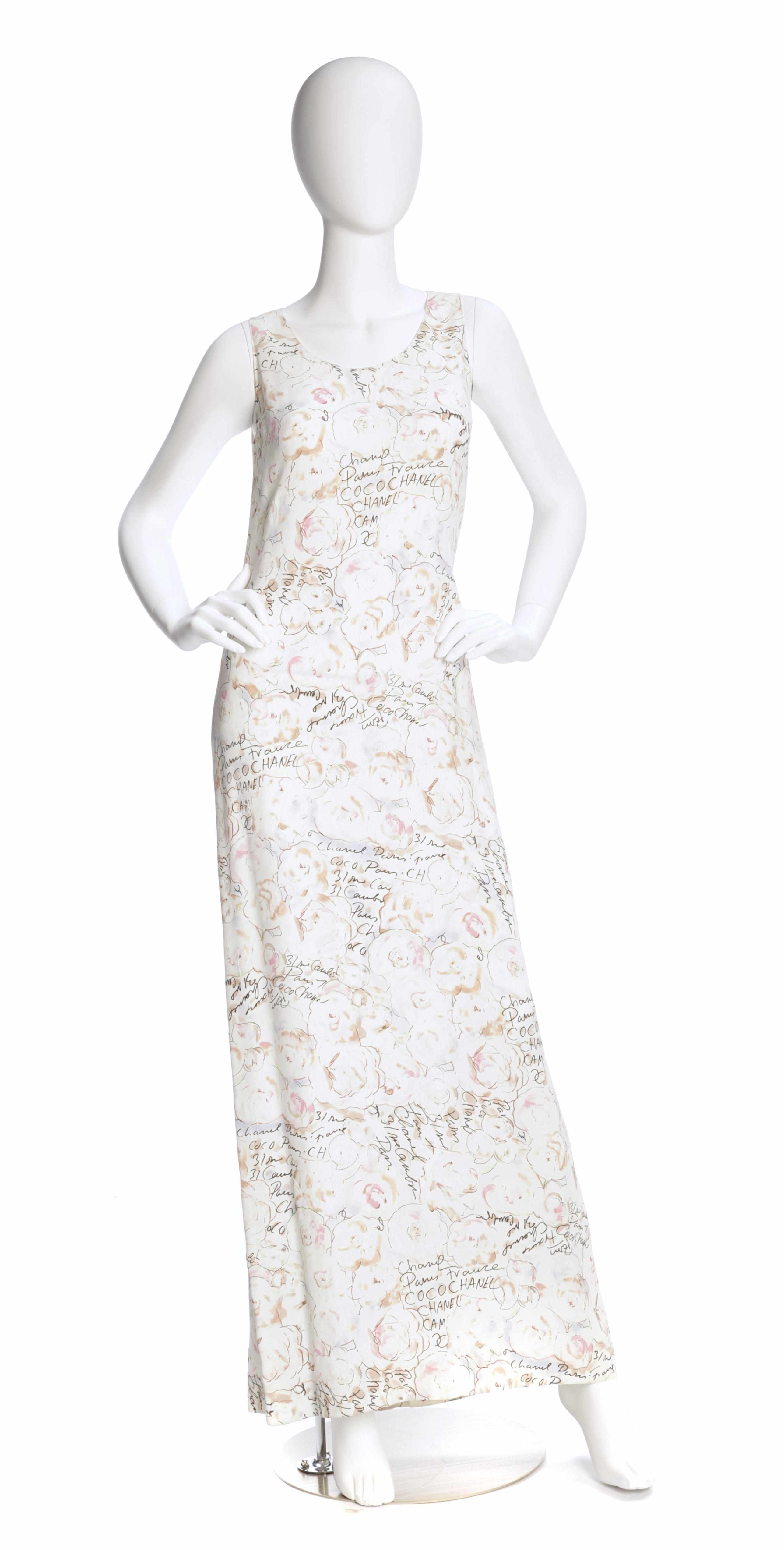 Appraisal: A Chanel long floral and 'signature' design dress sleeveless size