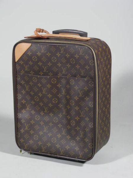 Appraisal: Louis Vuitton Small Pegase a rolling suitcase numbered SP x