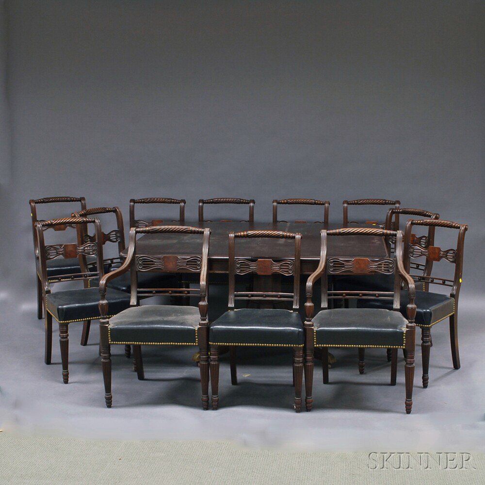 Appraisal: Classical-style Mahogany Dining Table and Twelve Chairs th century the