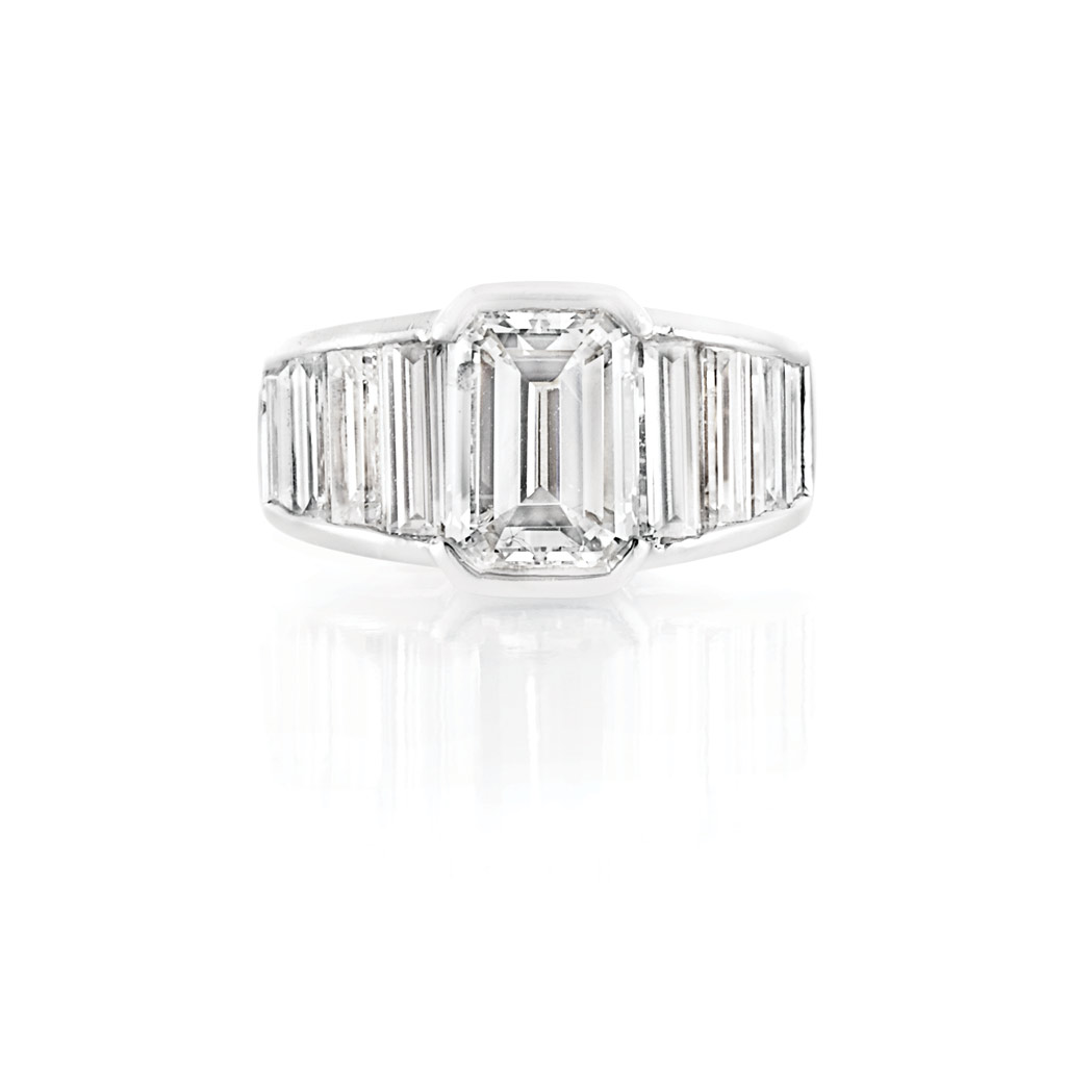 Appraisal: Gold Platinum and Diamond Ring Centering one emerald-cut diamond approximately