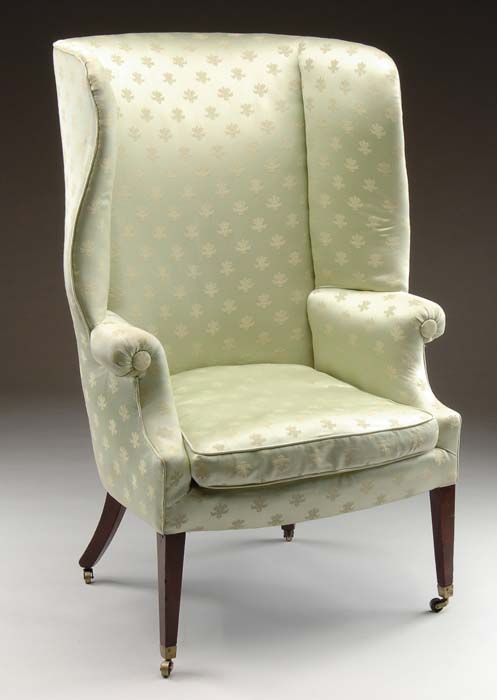 Appraisal: ANTIQUE BARREL BACK UPHOLSTERED WING CHAIR Nicely shaped wings and