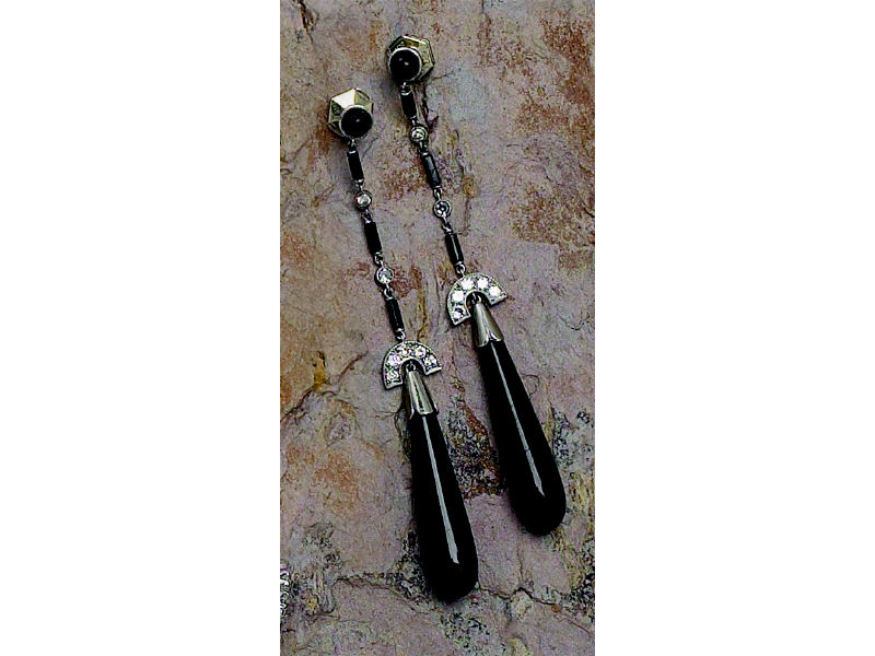 Appraisal: ONYX AND DIAMOND EARRINGS Platinum dangles with fourteen diamonds totaling