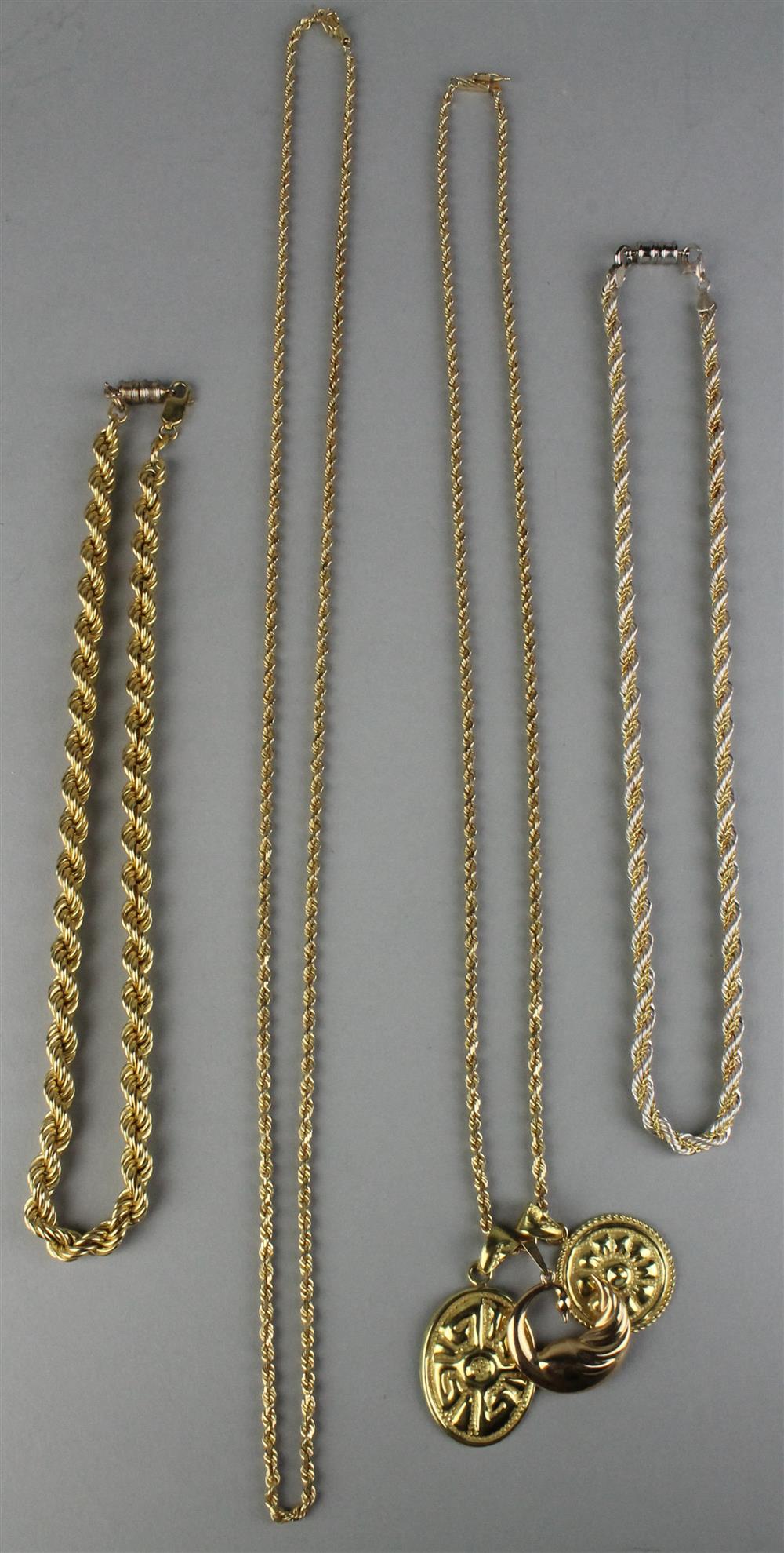 Appraisal: GOLD ROPE CHAINS WITH PENDANTS DWTS to include three k