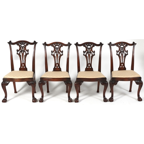 Appraisal: A set of four carved and mahogany stained dining chairs