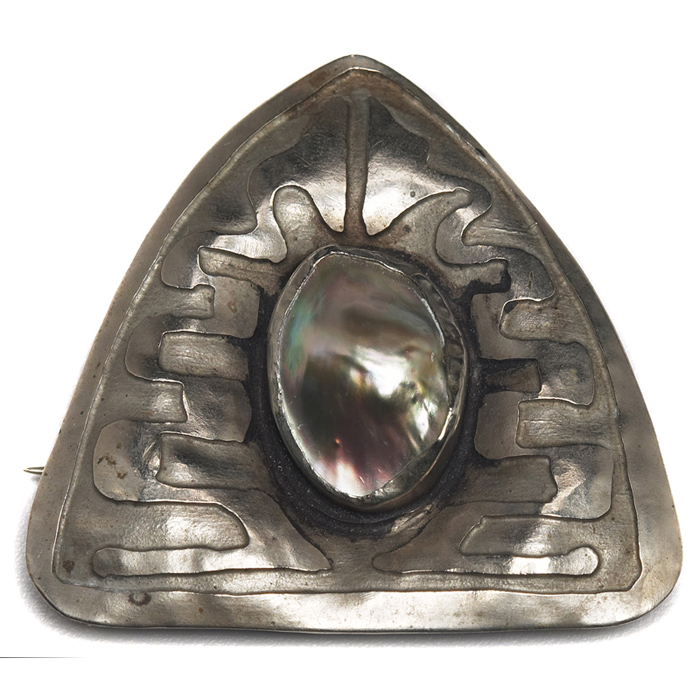 Appraisal: Arts Crafts pin triangular shape in hammered and tooled silver