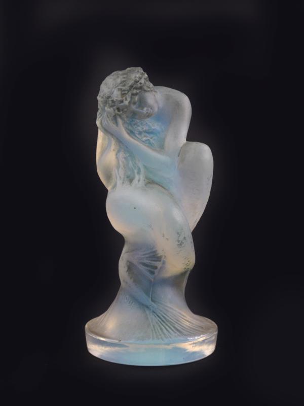 Appraisal: Sirene No a Lalique opalescent glass figural car mascot